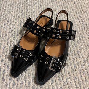 Stylish Black Women's Flats with Silver accents and buckles